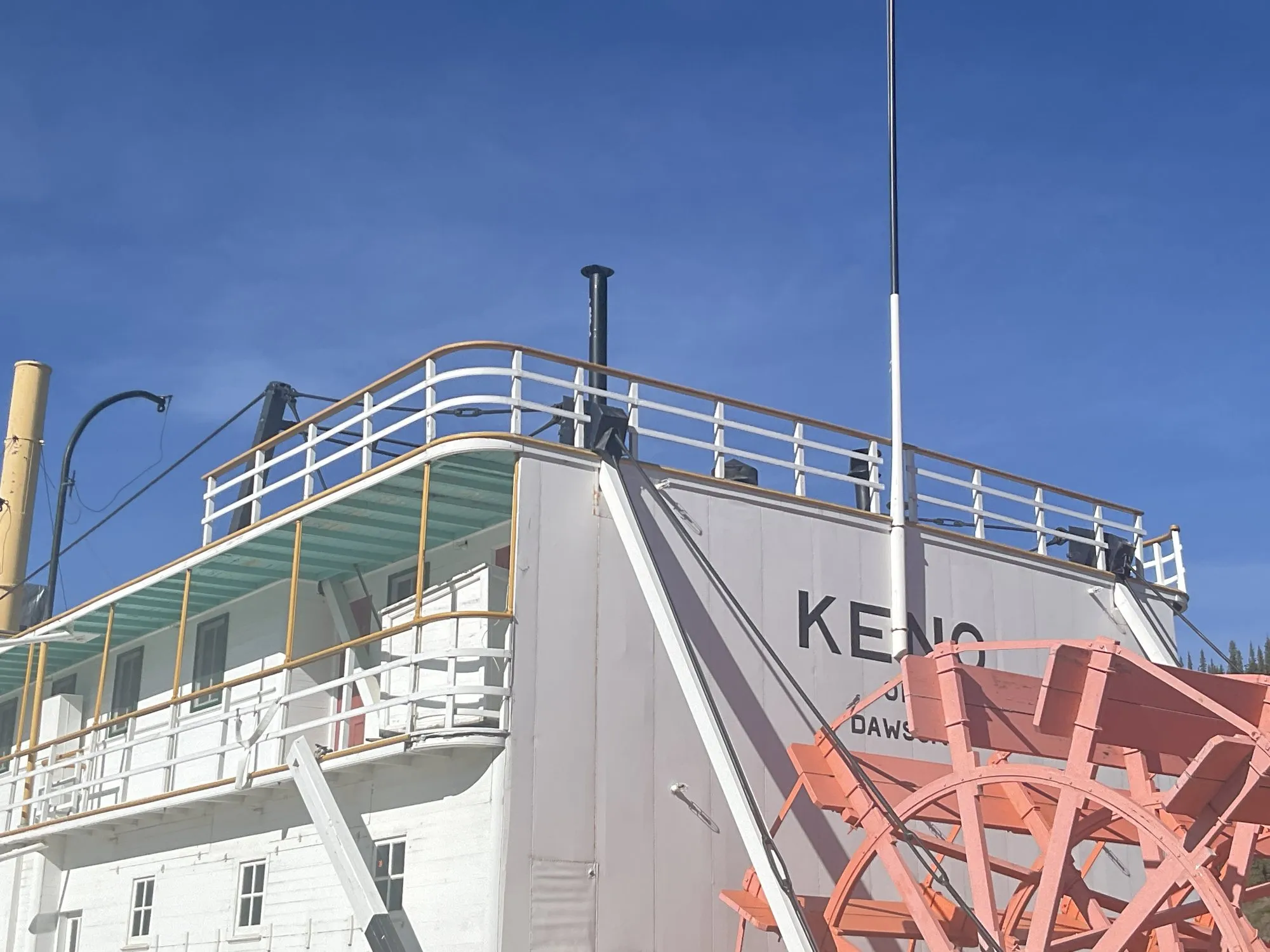 Stern with the name KENO on the fantail bulkhead and the sternwheel below
