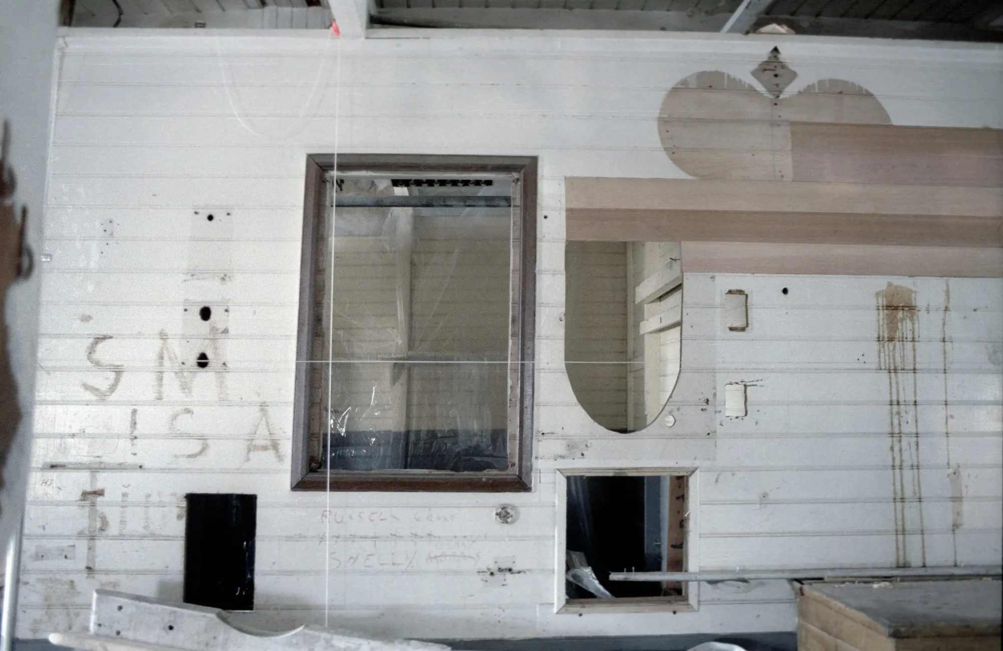 Bulkhead with window and decorative cut-outs